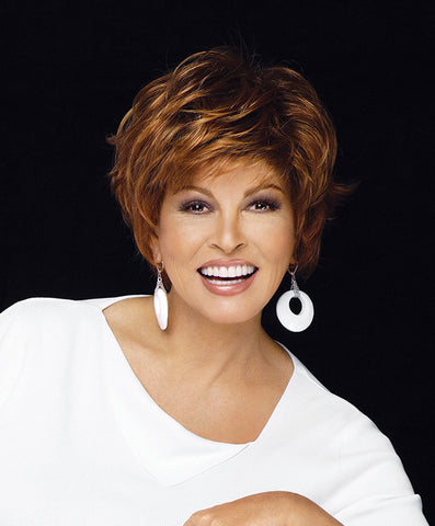 Raquel Welch Free Spirit  This classic short cut with the natural hairline of a Sheer Lines® front, the cool, light comfort of the Sheer Indulgence™ Top and our Non-Slip silicone construction, includes long softly waved layers on top and sides that beautifully blend into flipped, textured ends in the back.     Sheer Indulgence™ Non-Slip Monofilament Top Memory Cap® Base Vibralite® Synthetic Hair
