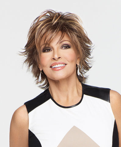 Raquel Welch Trend Setter  Loaded with layers, this mid-length shag adds fashion excitement with flipped textured ends throughout. A quick shake right out of the box and this cool, comfortable cut is ready-to-wear!     Memory Cap® II Vibralite® Synthetic Hair