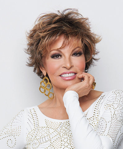 Raquel Welch Voltage  Short, barely waved, all over layers mean this stunning, no fuss salon cut can be worn full, smooth or somewhere in between!.     Memory Cap® Vibralite® Synthetic Hair