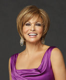 Raquel Welch Opening Act  Featuring a lace front Sheer Indulgence™ top and Tru2Life® synthetic hair for multiple styling options, this face-framing, layered cut has smooth, below-the-cheek sides that beautifully blend into a below-the-collar nape.     Sheer Indulgence™ Lace Front Monofilament Top Memory Cap® II Base Tru2Life Heat Styleable Synthetic Hair
