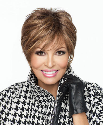 Raquel Welch Cover Girl  Generous length on top combined with all over precision layering and tapering gives a modern accent to the traditional boy cut. The Sheer Indulgence™ lace front monofilament top allows for off-the-face styling, parting versatility and a light, cool fit.     Sheer Indulgence™ Lace Front Monofilament Top Memory Cap II base
