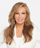 Raquel Welch Miles Of Style  Long layers fall to mid-back to create this full, flowing silhouette. Each softly sculpted wave is designed to add interest and movement to this long style. The Sheer Indulgence™ lace front monofilament part allows for off-the-face styling, and parting options.Sheer Indulgence™ Temple to Temple Lace Front Monofilament Part Memory Cap® III Base Vibralite® Synthetic Hair