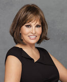 Raquel Welch Classic Cut  Featuring a Sheer Indulgence™ monofilament crown for a smooth contour, this collar length page is loaded with natural movement. And with our Tru2Life® synthetic hair, you can style it straight or add a soft wave.     Sheer Indulgence™ Monofilament Crown Memory Cap® II Base Tru2Life Heat Styleable Synthetic Hair