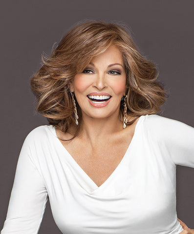 Raquel Welch Goddess  With a Sheer Indulgence™ lace front for the option of off-the-face styling and a monofilament top for varied parting choices, this barely waved, layered, shoulder length silhouette can also be curled for a more dramatic effect.     Sheer Indulgence™ Lace Front Monofilament Top Memory Cap® II Base Tru2Life Heat Styleable Synthetic Hair