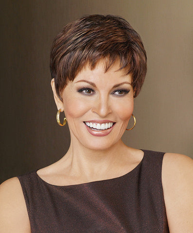 Raquel Welch Winner Elite  Under two ounces in weight, this light little pixie offers the same razor-like tapering of barely waved layers as our popular Winner style – with the added luxury of a Sheer Indulgence™ lace front monofilament top and 100% hand-tied base for the ultimate in styling options.     Sheer Indulgence™ Lace Front Monofilament Top 100% Hand-Knotted Base Vibralite® Synthetic Hair
