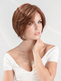 Devine Wig by Ellen Wille is a chin length, modern bob with layered sides